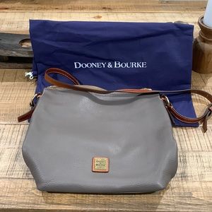 Brand new Dooney and Bourke crossbody and matching wallet!